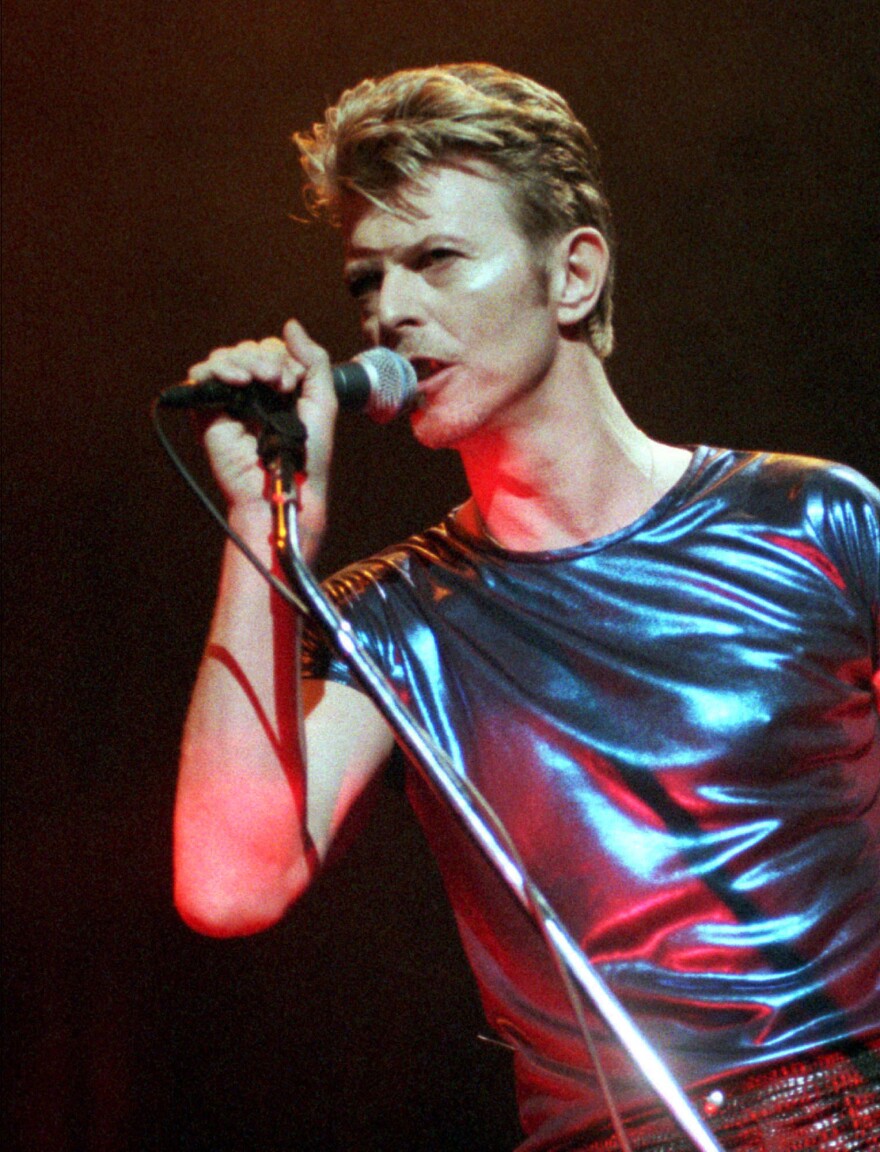 David Bowie performs during a concert in Hartford, Conn., on Sept. 14, 1995. 