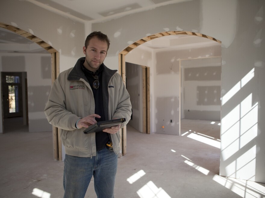 Christian Cerria has helped Mid-Atlantic Builders shrink the number of workers needed on a work site. The firm uses smartphones and tablets to fix designs and send them back to the office without shuttling workers back and forth.