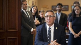 Senate Ways and Means Committee Chair Michael Rodrigues speaks during a supplemental budget conference committee meeting on July 16, 2025, flanked by staff in his office.