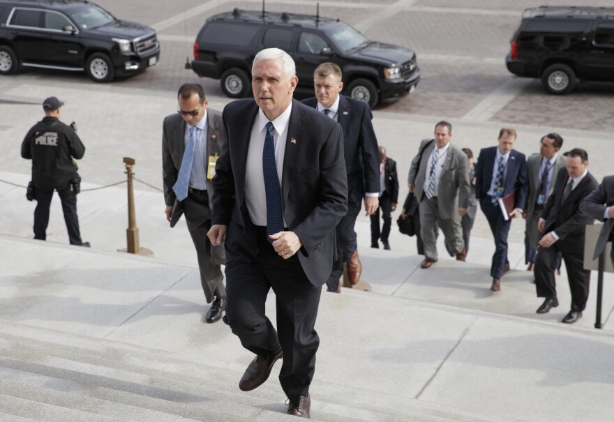 Vice President Pence arrives at the Senate to cast a tie-breaking vote for Betsy DeVos to be education secretary on Tuesday.