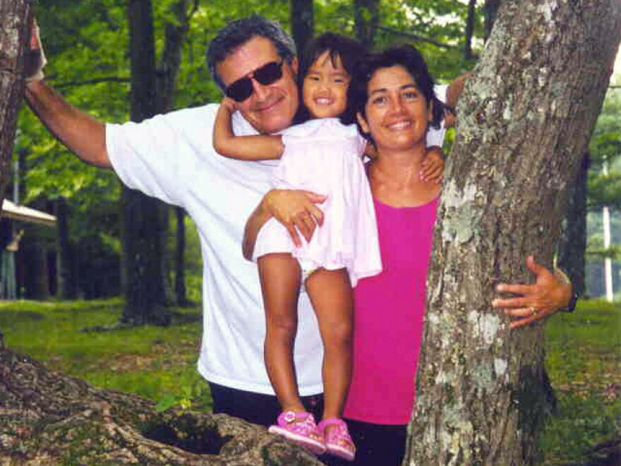 Bob and Alice Gerold adopted Aimee when she was an infant; here, they pose for a family photo.