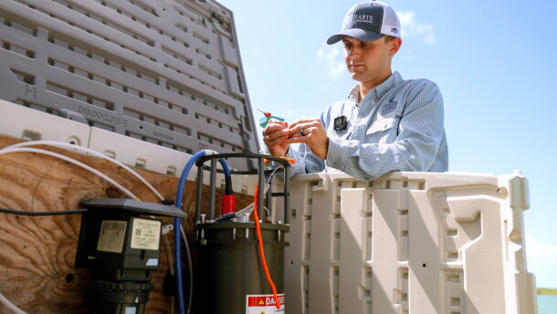 Dalton Tryba, a research specialist at Harte Research Institute (HRI) at Texas A&M University-Corpus Christi, works on a imaging flowcytobot. HRI partners with institutions across the state to early detect, and notify others about, harmful algal blooms using artificial intelligence models and advanced underwater imaging.