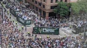 A view of the Milwaukee Bucks NBA Championship parade from WUWM on the corner of Water St. and Wisconsin Ave. in downtown Milwaukee.