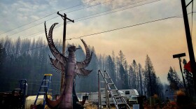 Viribus the Phoenix, installed in the main street area of Blue River, August 26, 2021.&nbsp; New wildfires in the region coat the area in smoke.