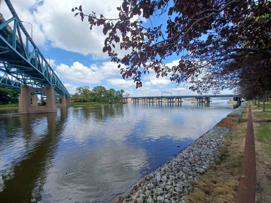 The view along the river currently shows the old, I-74 bridge to be torn down (on the left) and the Moline side of the new, I-74 bridge (center and to the right).