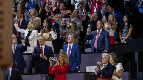 Texas Attorney General Ken Paxton, the state's GOP nominee for U.S. Senate, listens as President Donald Trump addresses the Republican midterm convention crowd in Dallas on Thursday, Sept. 10, 2026.