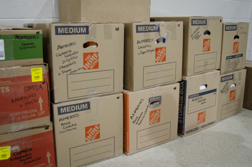 Food, medical supplies and other aid piles up at the Salvation Army Blue Valley Corps