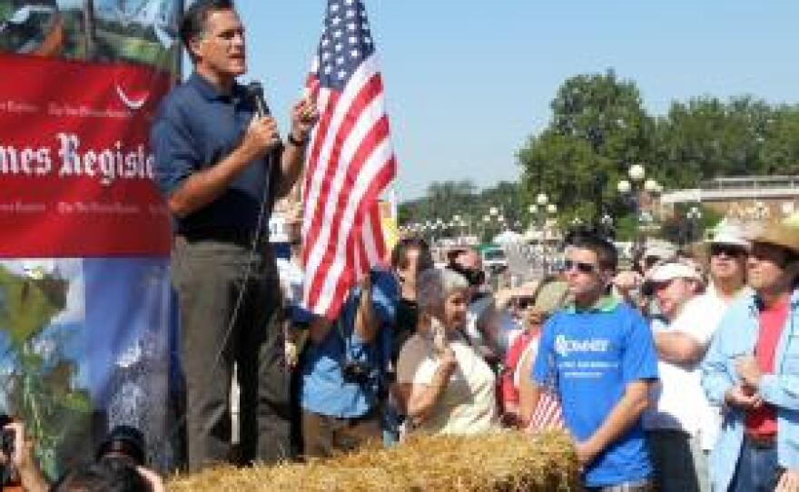 Republican presidential hopeful Gov. Mitt Romney speaks to a crowd at the Iowa State Fair in August.