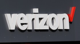 FILE - A Verizon sign is displayed on a store, Sept. 30, 2025, in Cambridge, Mass. (AP Photo/Charles Krupa, file)