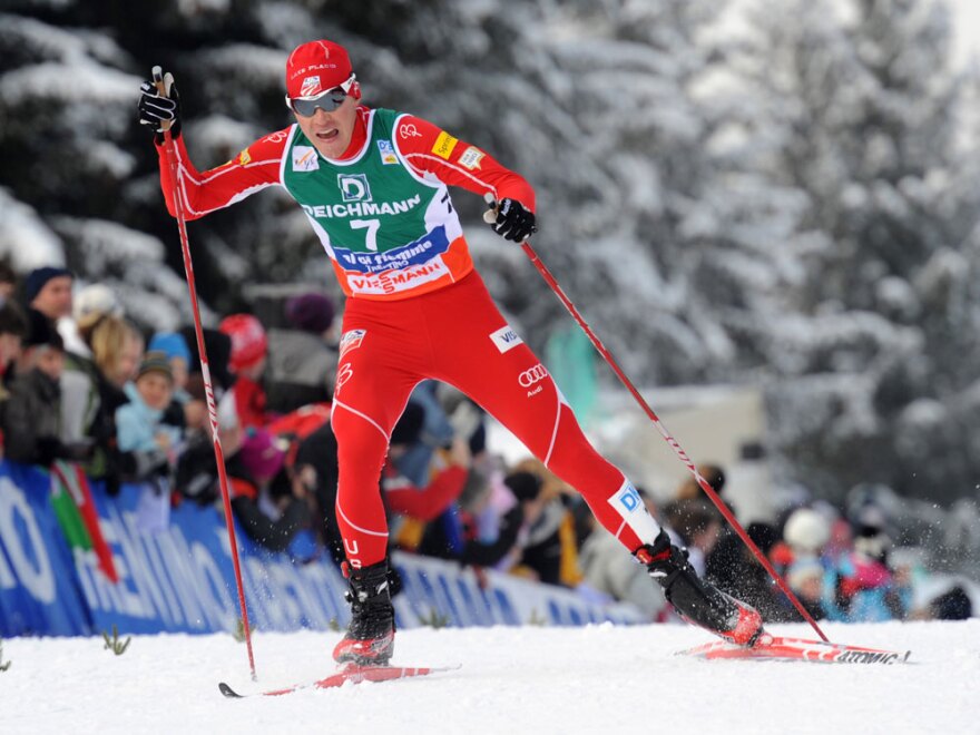 Bill Demong crosses the finish line to win a Men's Nordic combined of the Tour de Ski in Val di Fiemme, Italy, on Jan.10.