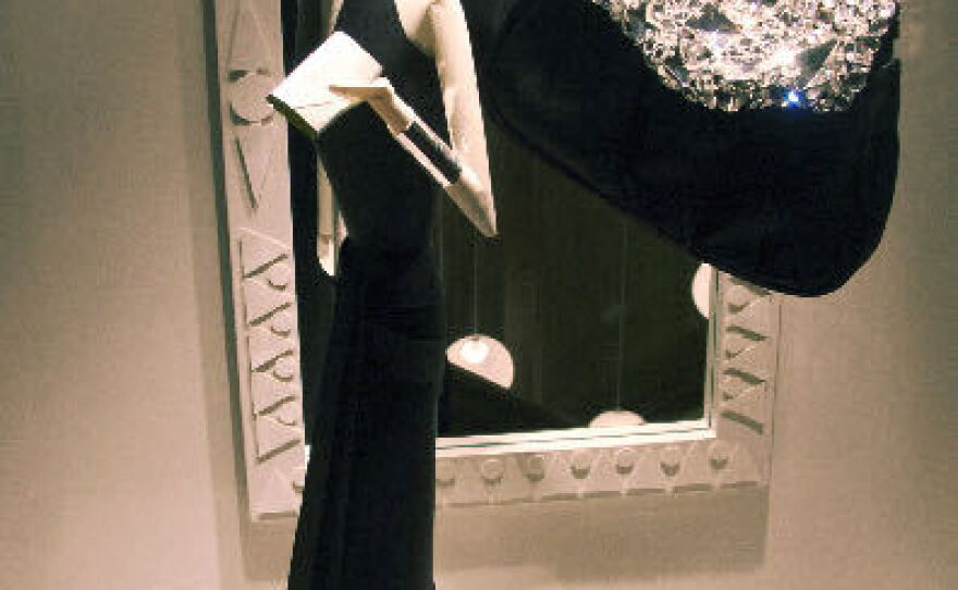 Reproductions of Neiman Marcus ads from 1948 in paper sculpture, 2007.