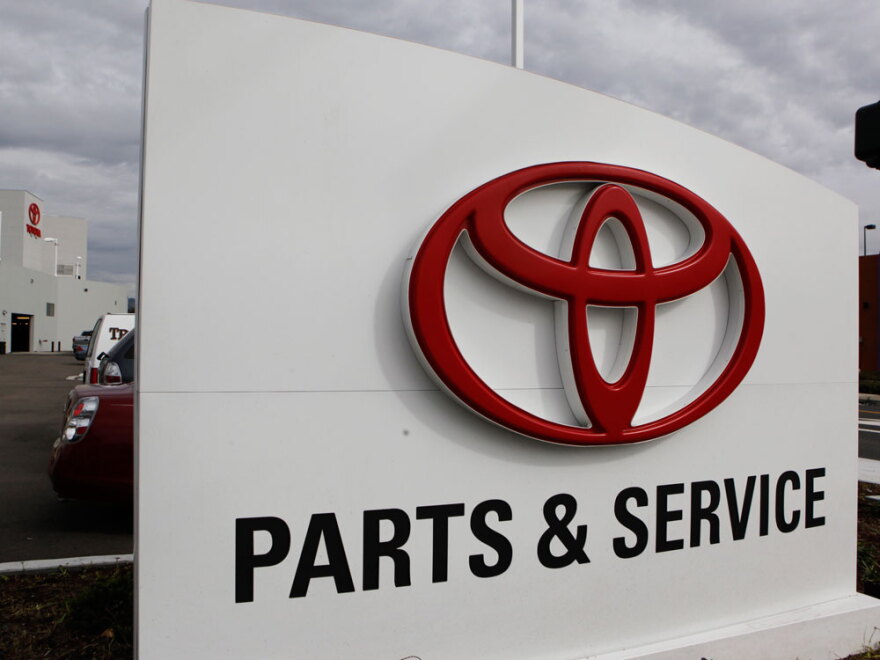 A sign for the parts and service department is shown at a new Toyota dealership in Oakland, Calif.