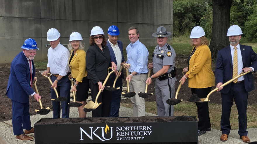 Kentucky Gov. Andy Beshear (center) and other officials broke ground on a new regional medical examiner's office in Highland Heights on Sept. 18, 2026.