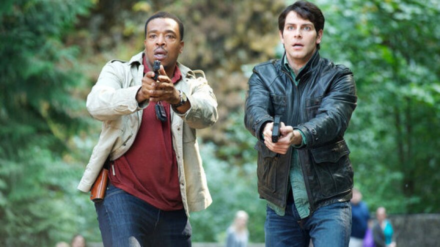 Russell Hornsby as Hank Griffin and David Giuntoli as Nick Burkhardt on NBC's <em>Grimm</em>.