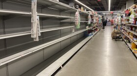 Shelves stand empty of bottled water following a chemical spill into the Delaware River upstream from Philadelphia. (Matt Rourke/AP)