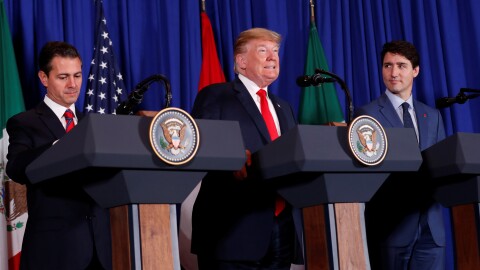 President Donald Trump signed the USMCA trade deal on Friday, alongside Canada's Prime Minister Justin Trudeau and Mexico's President Enrique Peña Nieto in Buenos Aires.