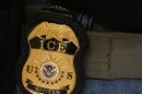 FILE - A federal agent wears an Immigration and Customs Enforcement badge in New York, June 10, 2025. (AP Photo/Yuki Iwamura, File)
