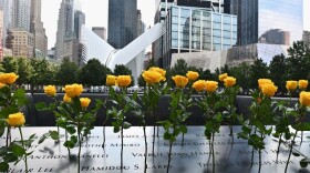 Flowers are placed at the 9/11 Memorial and Museum in New York on Sept. 11, 2020, as the U.S. commemorates the 19th anniversary of the 9/11 attacks. (Angela Weiss/AFP/Getty Images)