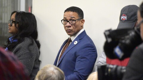 Whitehall Mayor Michael Bivens looks on as new city councilmembers are sworn in on December 9, 2025. Newly reelected Councilmember Gerald Dixon was sworn in that evening, hours after he was released from jail. Dixon was arrested the day before and accused of sexual misconduct with a minor.