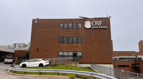 Roof damage at OSF St. Joseph Medical Center in Bloomington led to the hospital closing to trauma. Ambulances are being diverted elsewhere.