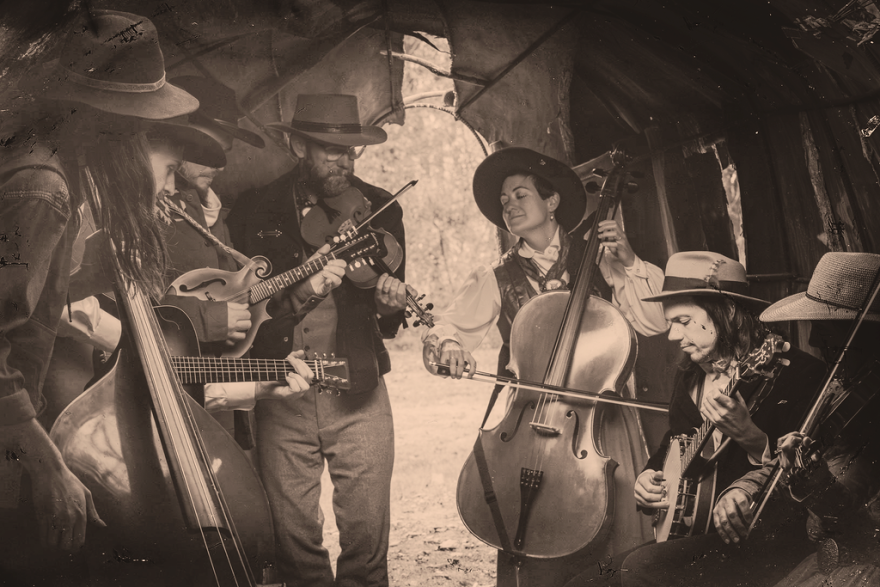 Funslinging Debutants gathered in the hut