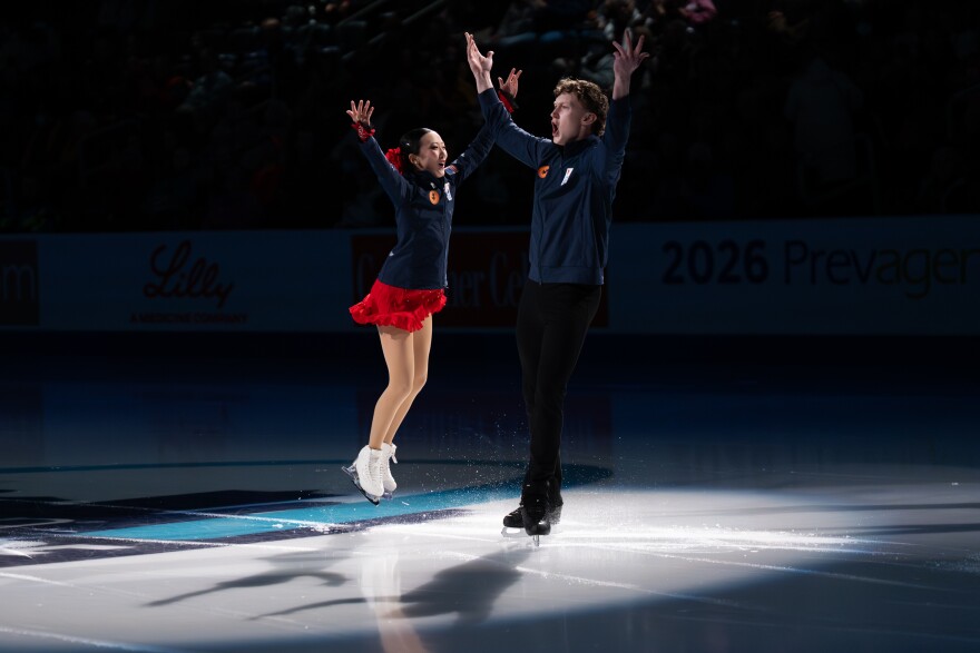 Naomi Williams of SC of Boston, and Lachain Lewer, of Broodmoor SC, hype up the crowd before competing in the championship pairs short program during the 2026 U.S. Figure Skating Championships at the Enterprise Center on Wednesday, Jan. 7, 2026, in St. Louis’ Downtown West neighborhood.