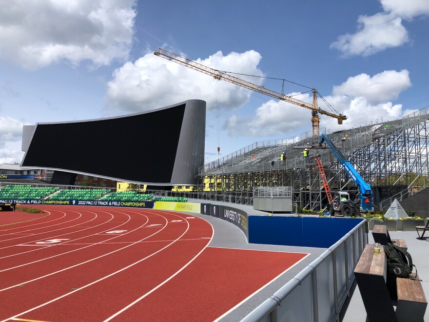 A new video screen dominates the south end of the field. Crews are assembling extra seating, right, in advance of the World Championships in July.