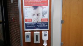 Starting last year, UF Health Shands Hospital put up health stations where patients and visitors can learn more information about the flu and get tissues, masks and hand sanitizer (Charlie Daffron/WUFT News)