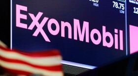 In this April 23, 2018, file photo, the logo for ExxonMobil appears above a trading post on the floor of the New York Stock Exchange. (Richard Drew, File/AP)