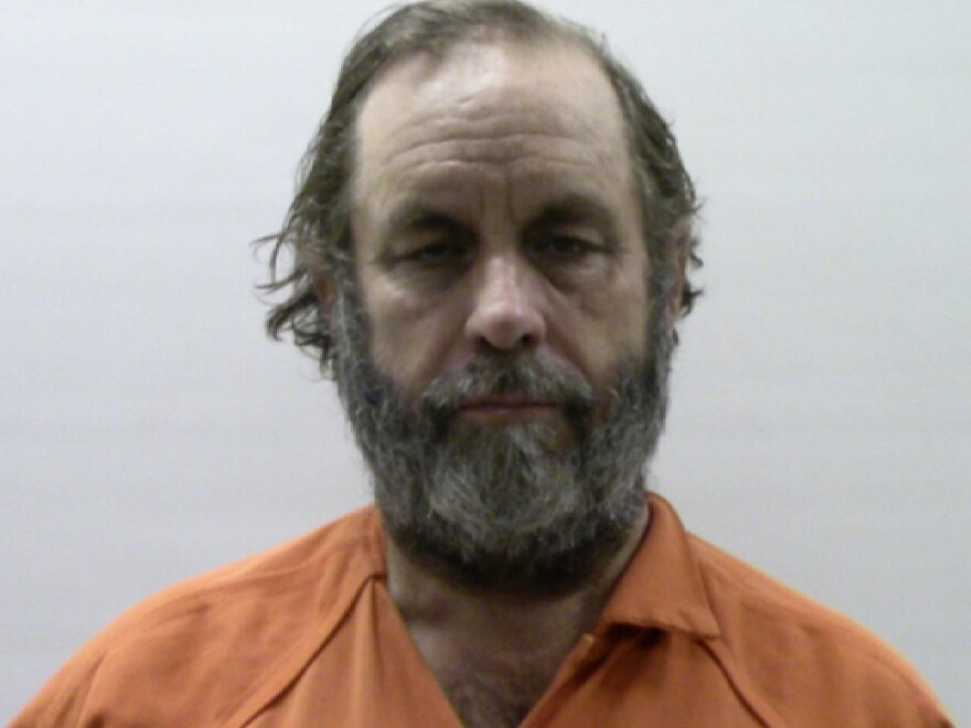 Jeffrey Henry, seen here in his booking photo, remains in custody in Cameron County, Texas, while he awaits extradition to Kansas.
