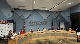 Board members at the Buncombe County School Board meeting on Dec. 7.