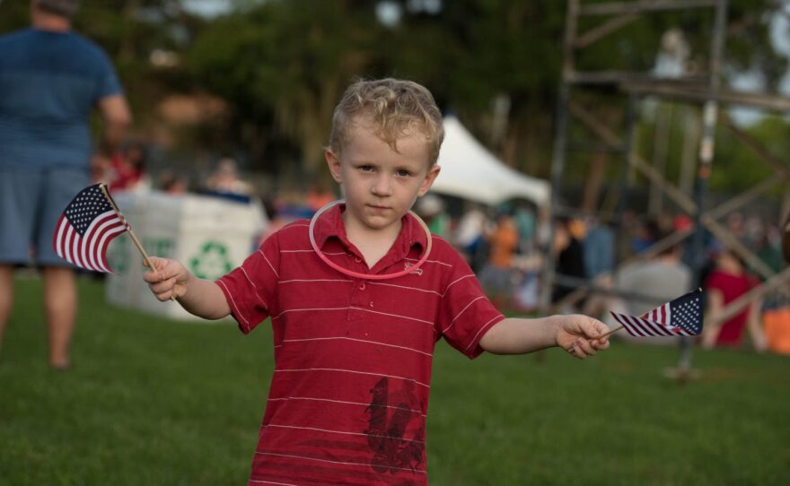 Families and children streamed in to Flavet to celebrate the nation's birthday. (Photo by Steve Johnson/WUFT News)