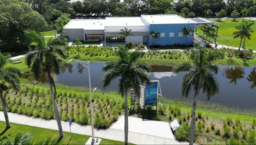 Aerial view of Caloosahatchee Water Wall and Alliance for the Arts administrative building, gallery and theater in backdrop.