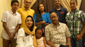 The Gabriel family: front row, from left, is the mother Hind, Yara, and the father Hamror. At rear from left, Omer, Thabit, Ithar, Mohammed, and AbdulRahman. This photo was taken in Malaysia, before the family came to the U.S.