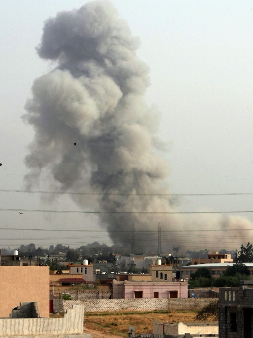 Smoke billows from a suburb of the Libyan capital Tripoli, on June 4, after a NATO air strike. NATO planes bombed Libya for months, assisting rebels who eventually ousted Moammar Gadhafi.