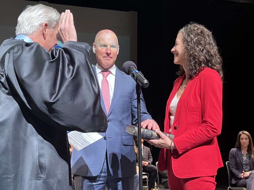 Cape and Islands District Attorney Robert Galbois takes the oath of office Wednesday with his wife, Nikki Galibois, by his side. Superior Court Judge Mark Gildea administered the oath.