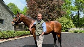 Adrian Mansergh Wallace and Triple Crown winner American Pharaoh at Coolmore Ashford's Stud in Versailles