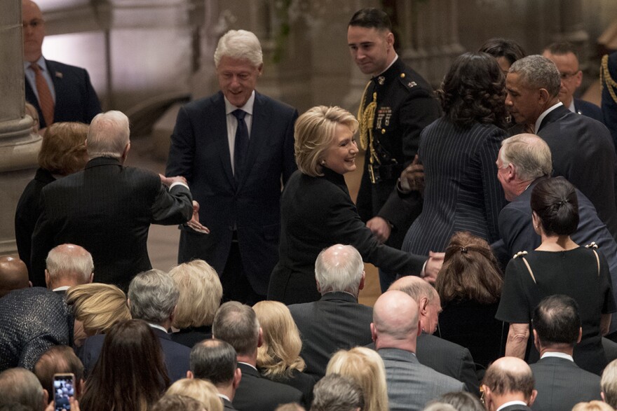 Former President Jimmy Carter, second from left, and former first lady Rosalynn Carter, left, greet former President Bill Clinton as his wife, former Secretary of State Hillary Clinton, center, greets a guest before George H.W. Bush's funeral.