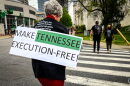 Protesters enter the last leg of the 9-mile walk from Riverbend Maximum Security Institution to War Memorial Plaza in an Easter Sunday anti-death penalty March4Mercy in 2022.