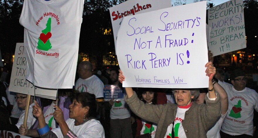 Protesters at Dartmouth College in Hanover, NH let Gov. Perry and other GOP candidates know they don't like some of their economic policies.