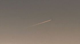 A jet flies over the author's home
