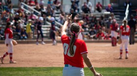 Center fielder Andrea Howard (#00) lifts up a No. 1 with her fingers after pitcher Emma Guindon gets a strikeout during the last game of the series against Fresno State on Saturday, April 16 at the Lobo Softball Field.