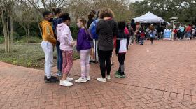  Hundreds of children and their parents lined up for a COVID-19 shot at a Louisiana Department of Health vaccine clinic in New Orleans.