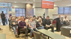 Audience members, most of them opponents of a proposed data center in Pekin, filled the Pekin City Council meeting room Monday about 20 minutes before the start of the council meeting.