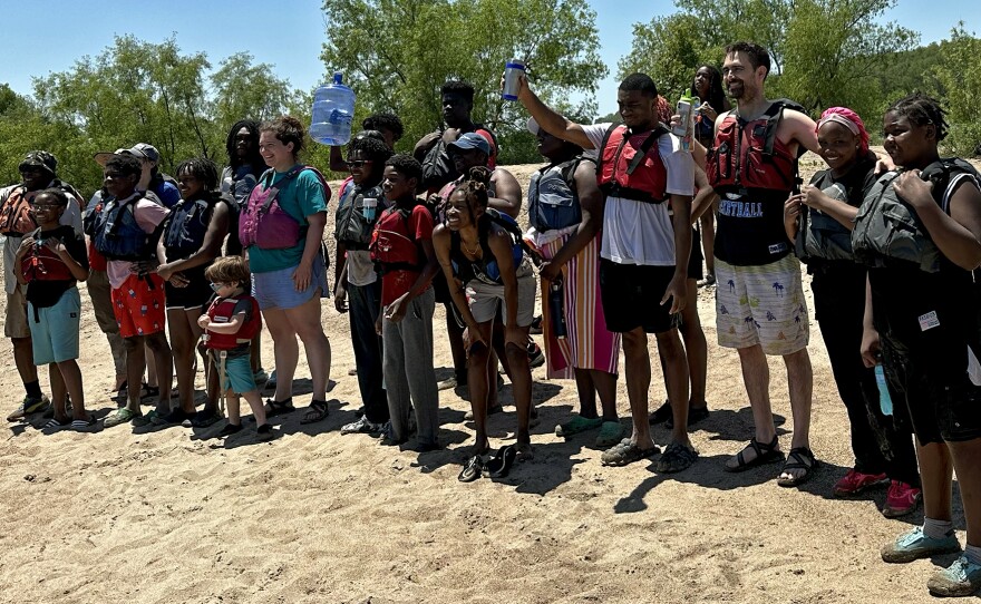 Youth and leaders with Spring Initiative pose for a group photo on Montezuma Island, nine miles by boat from Helena, Arkansas, on Saturday, May 11, 2024