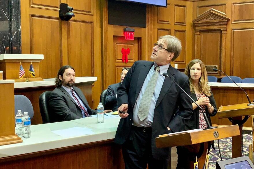 Attorney Bill Groth, center, discusses his election security presentation as Butler Professor Greg Shufeldt, left, looks on.