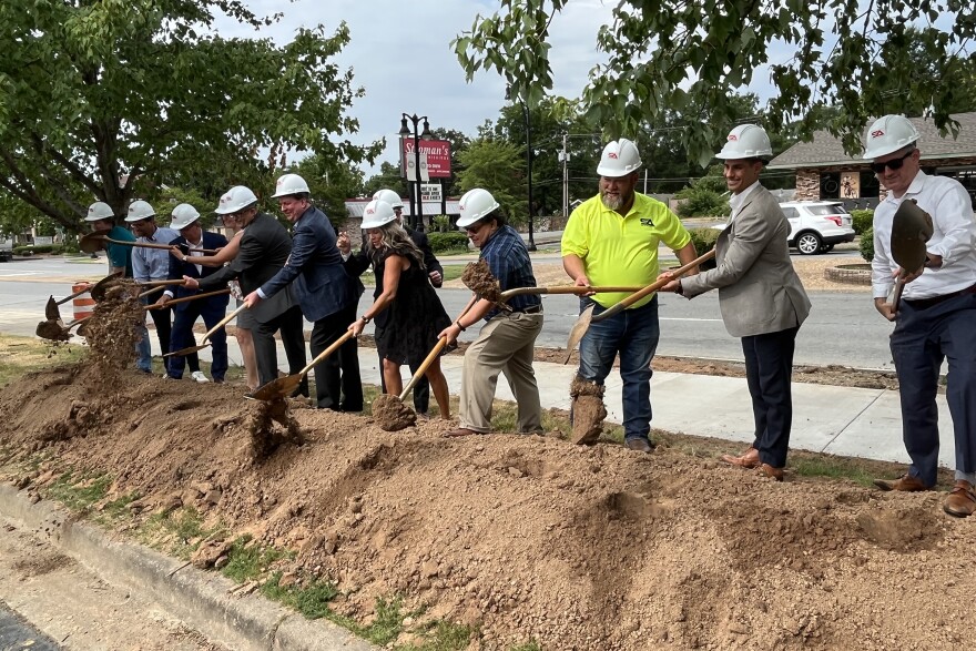 North Little Rock city and business leaders take part in a ceremonial groundbreaking Wednesday along JFK Blvd. for the Jump Start program.