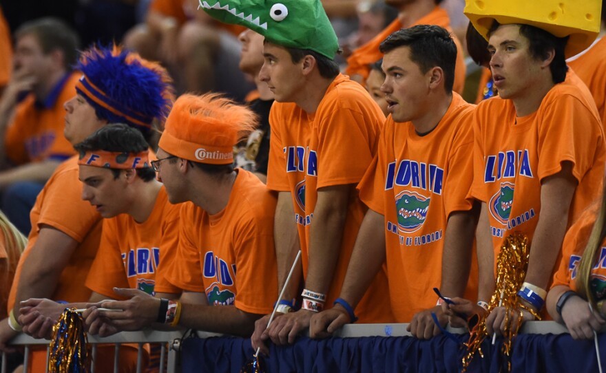 As Kentucky's lead grows, members of the Rowdy Reptiles can only watch as their team's chances of victory slowly disapear. (Greenberry Taylor/WUFT News)