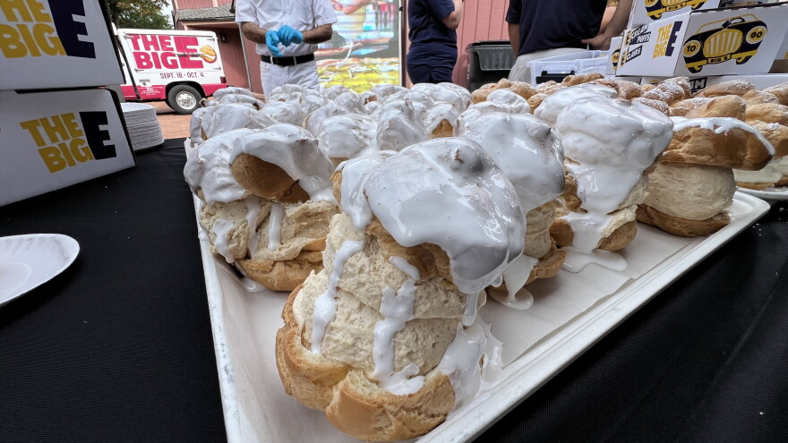 This year's renditions of The Big E's iconic cream puffs includes one with a "Fluffernutter" twist - peanut butter-infused cream with marshmallow sauce drizzled on top.