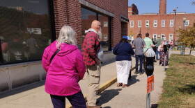 Long lines formed outside Bloomington's election headquarters on the first day of early voting.